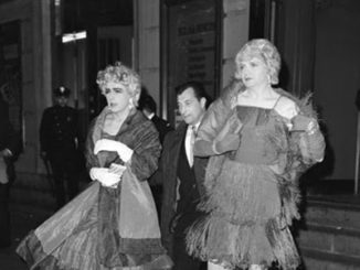 black and white image of LGBT drag queens being arrested.