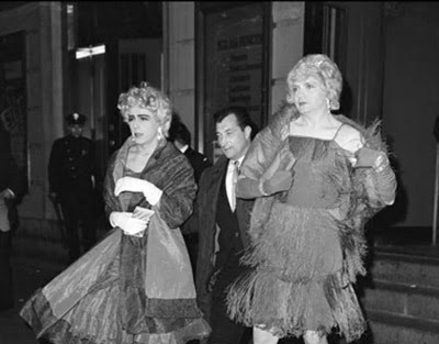 black and white image of LGBT drag queens being arrested.